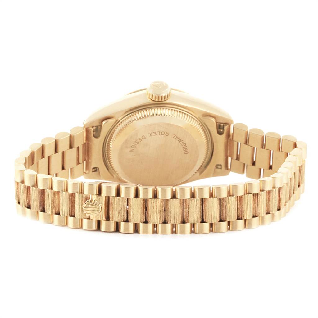 The image shows the back side and bracelet of a Rolex President 69278 Women
s Yellow Gold Champagne Dial 69278 Women
s Yellow Gold Champagne Dial model watch.