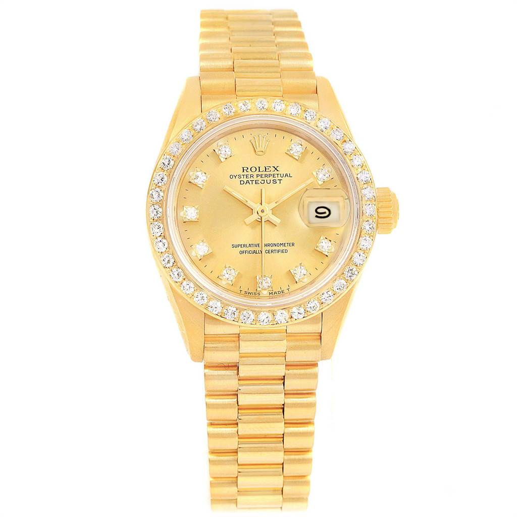The image shows a frontal view of the Rolex President 69138 Women's Yellow Gold Champagne Dial 69138 Women's Yellow Gold Champagne Dial model watch, displaying its gold case, bracelet, diamond bezel, and date window.