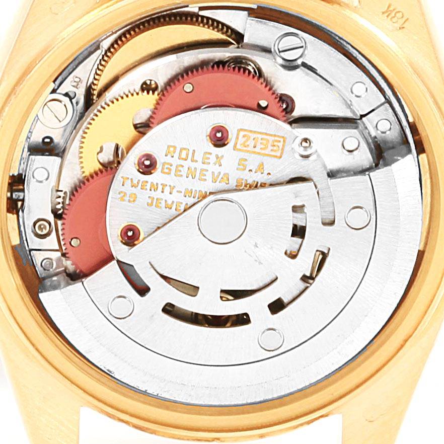 The image shows the inner mechanical movement of the Rolex President 69178 Women
s Yellow Gold Champagne Dial 69178 Women
s Yellow Gold Champagne Dial model watch, viewed from the back.