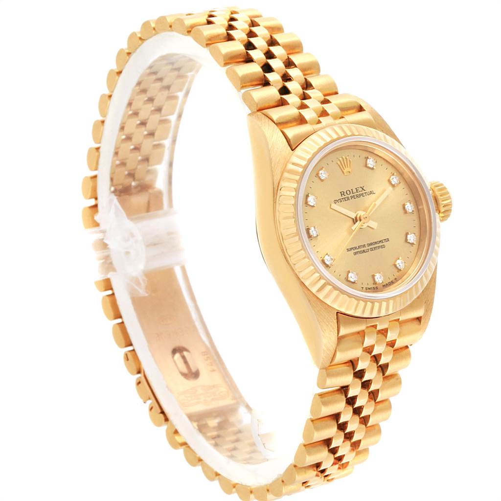 The image shows a side angle of the Rolex President 67198 Women
s Yellow Gold Champagne Dial 67198 Women
s Yellow Gold Champagne Dial model watch, highlighting its gold bracelet and diamond-accented dial.