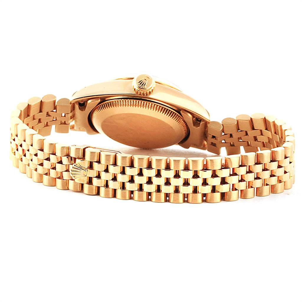 This image shows the back view and bracelet of a Rolex President 67198 Women
s Yellow Gold Champagne Dial 67198 Women
s Yellow Gold Champagne Dial model watch.