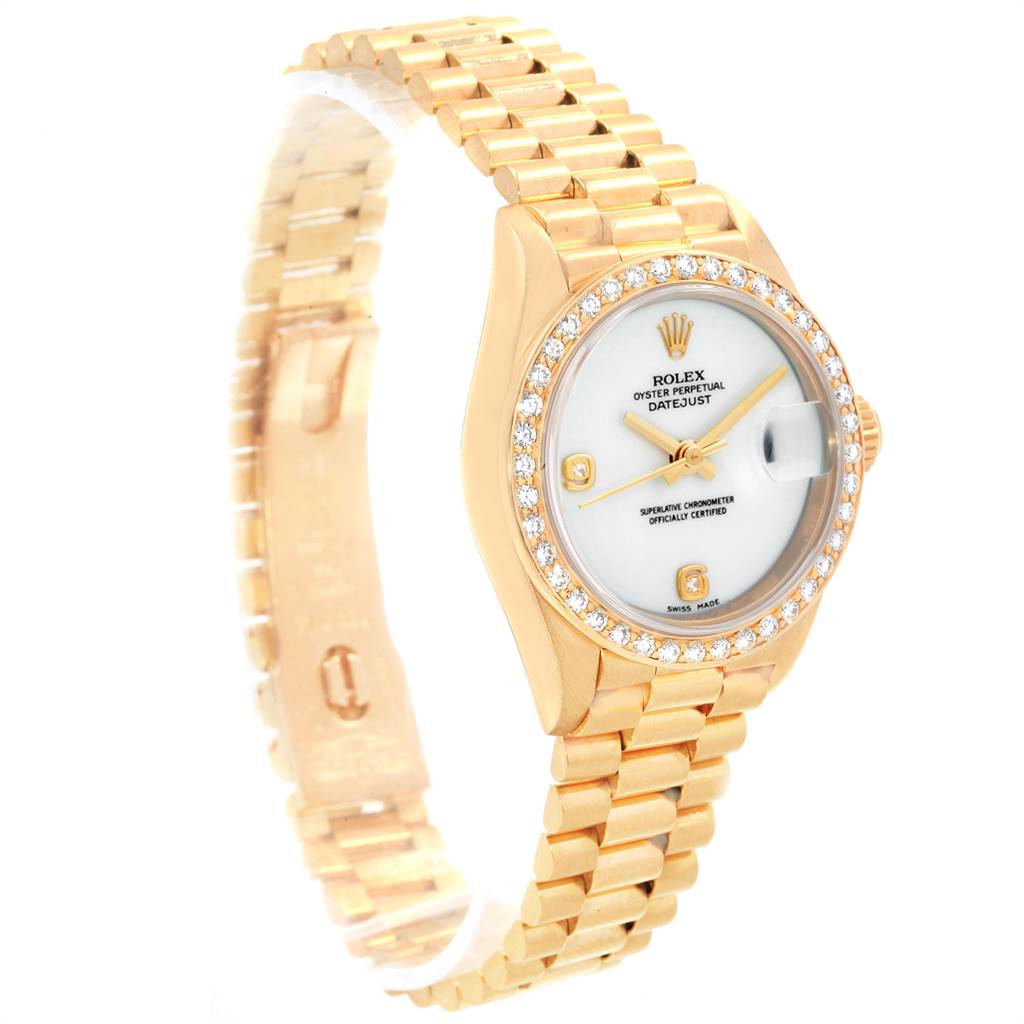 The image shows a side and slightly angled view of a Rolex President 69178 Women
s Yellow Gold Black Dial 69178 Women
s Yellow Gold Black Dial model watch, highlighting its band, case, and face.