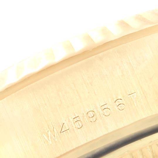 The close-up image shows the serial number engraving on the side of the President model by Rolex.