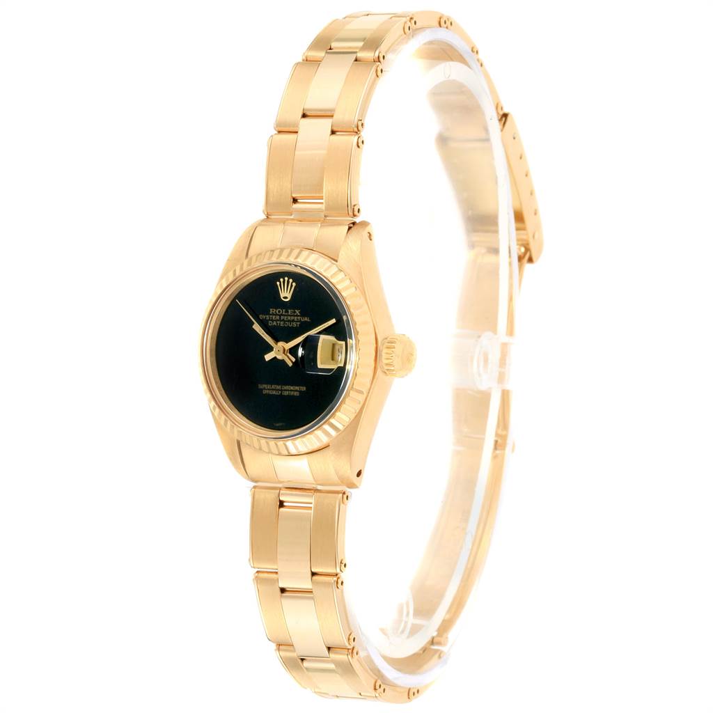 The image shows a Rolex President 6917 Women
s Yellow Gold Black Dial 6917 Women
s Yellow Gold Black Dial model watch from a side angle, highlighting the bracelet, bezel, and black dial.