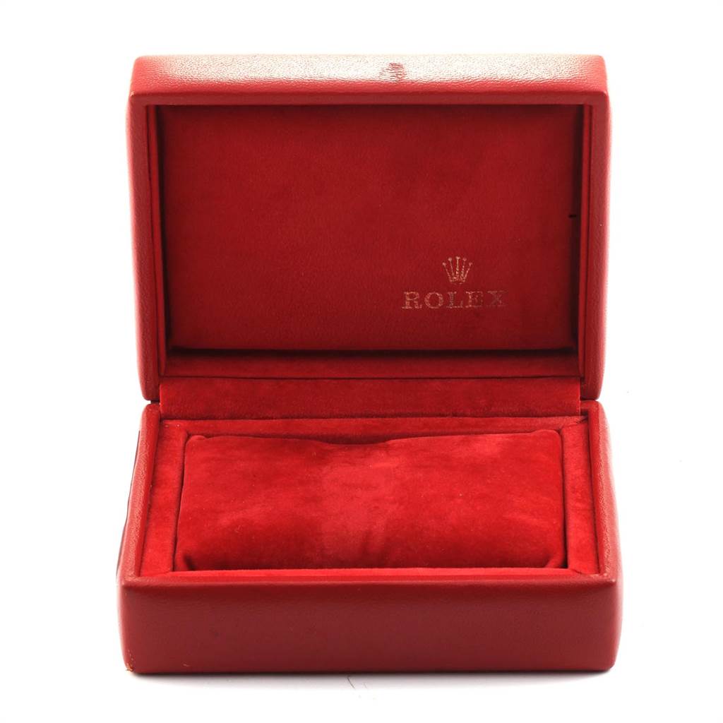 The image shows an open red Rolex watch box, presumably for a President model watch.