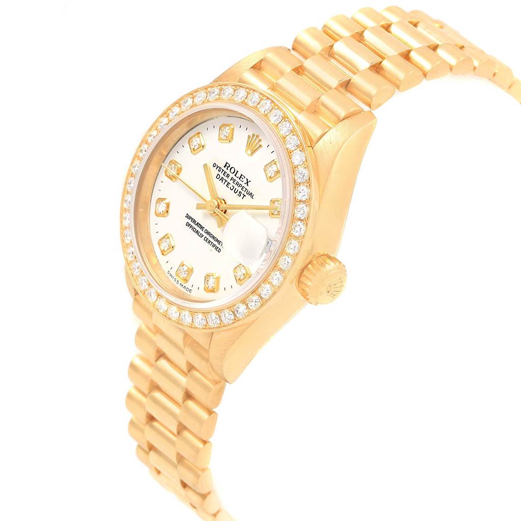 The image shows a close-up angle of the Rolex President 79178 Women's Yellow Gold White Dial 79178 Women's Yellow Gold White Dial watch, featuring its bezel, dial, case, crown, and bracelet.