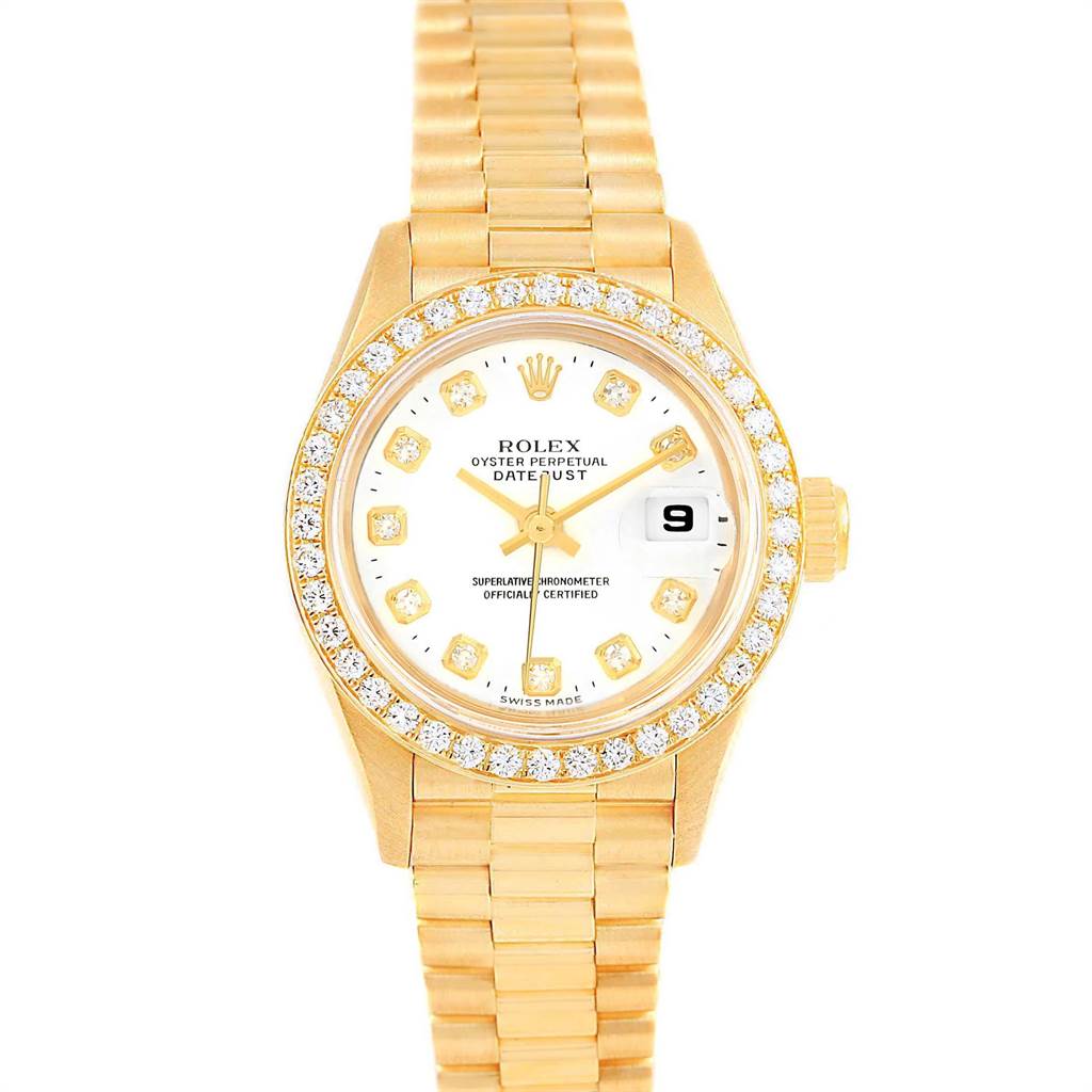 This image shows a front view of a Rolex President 79178 Women's Yellow Gold White Dial 79178 Women's Yellow Gold White Dial model watch with a gold band and a diamond-studded bezel.