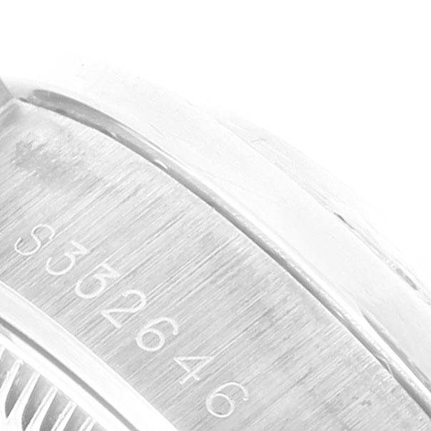 The image shows a close-up of the serial number on the case of a Rolex President 68286 Women's Platinum Silver Dial 68286 Women's Platinum Silver Dial model watch.