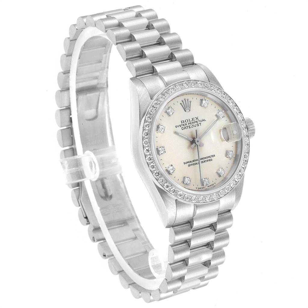 The image shows a Rolex President 68286 Women's Platinum Silver Dial 68286 Women's Platinum Silver Dial model watch angled slightly from the side, highlighting its bracelet and diamond-encrusted bezel.