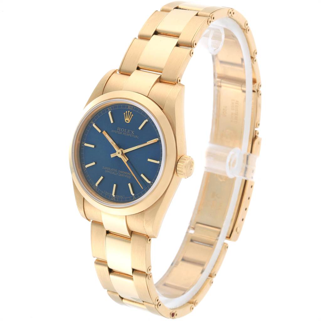 The image shows an angled view of the Rolex President 67488 Women's Yellow Gold Blue Dial 67488 Women's Yellow Gold Blue Dial model watch, displaying the watch face, crown, and band.