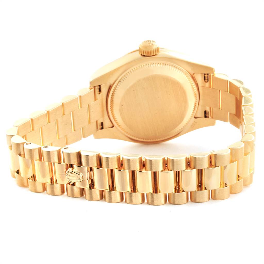 The image shows the back of the Rolex President 179298 Women's Yellow Gold Silver Dial 179298 Women's Yellow Gold Silver Dial model watch, highlighting its gold case and President bracelet.