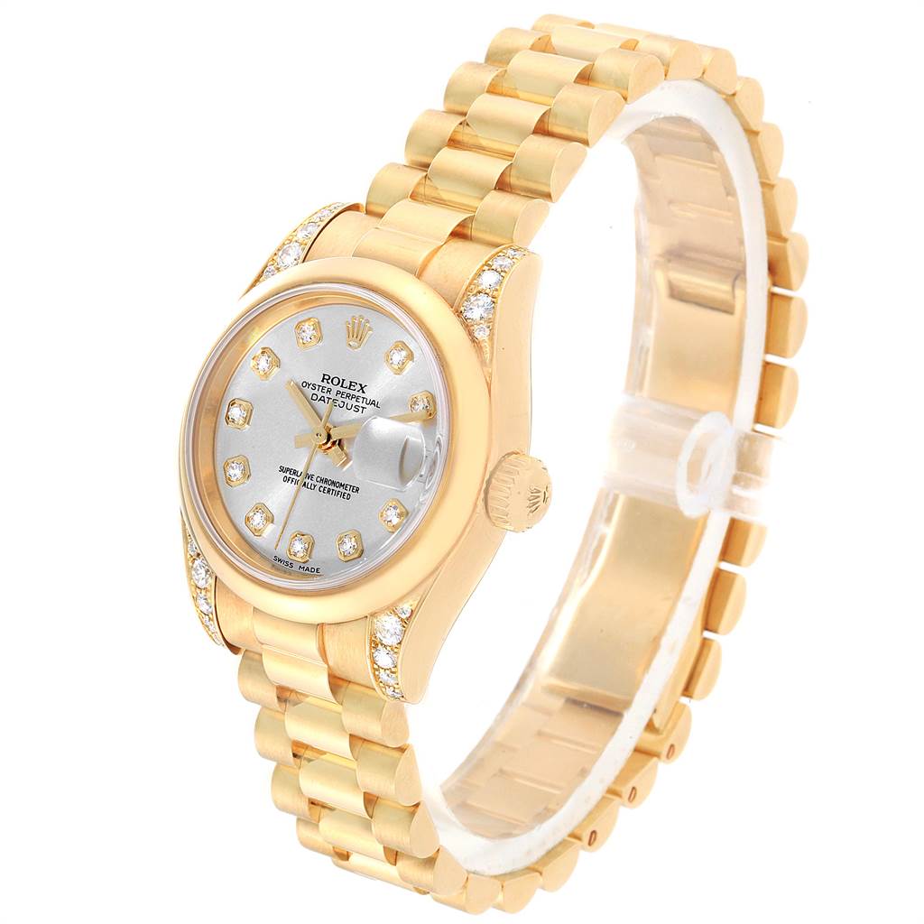 The image shows a Rolex President 179298 Women's Yellow Gold Silver Dial 179298 Women's Yellow Gold Silver Dial model watch at a three-quarter angle, highlighting its gold bracelet, diamond bezel, and silver dial.