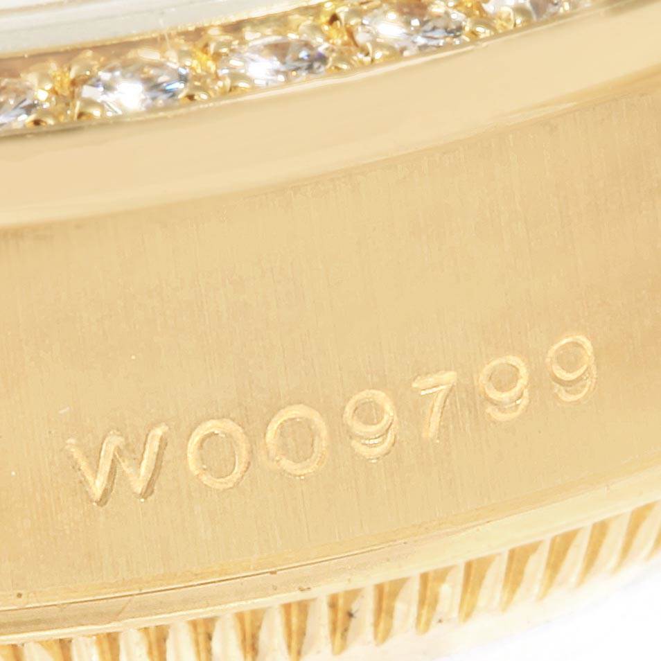 This close-up image shows the side view of the President model by Rolex, focusing on its bezel and engraved serial number.