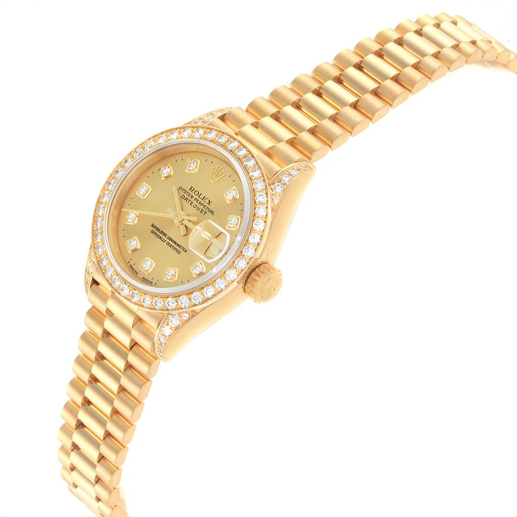 The image shows a side-angle view of a Rolex President 69158 Women
s Yellow Gold Champagne Dial 69158 Women
s Yellow Gold Champagne Dial model watch, highlighting its gold bracelet, diamond bezel, and dial.