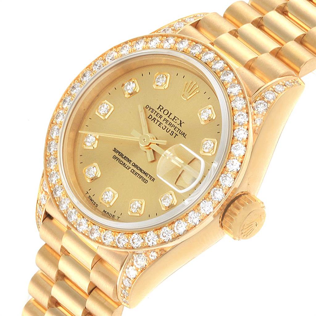 The image shows a close-up angle of the Rolex President 69158 Women
s Yellow Gold Champagne Dial 69158 Women
s Yellow Gold Champagne Dial model watch, highlighting its gold dial, diamond bezel, and bracelet.