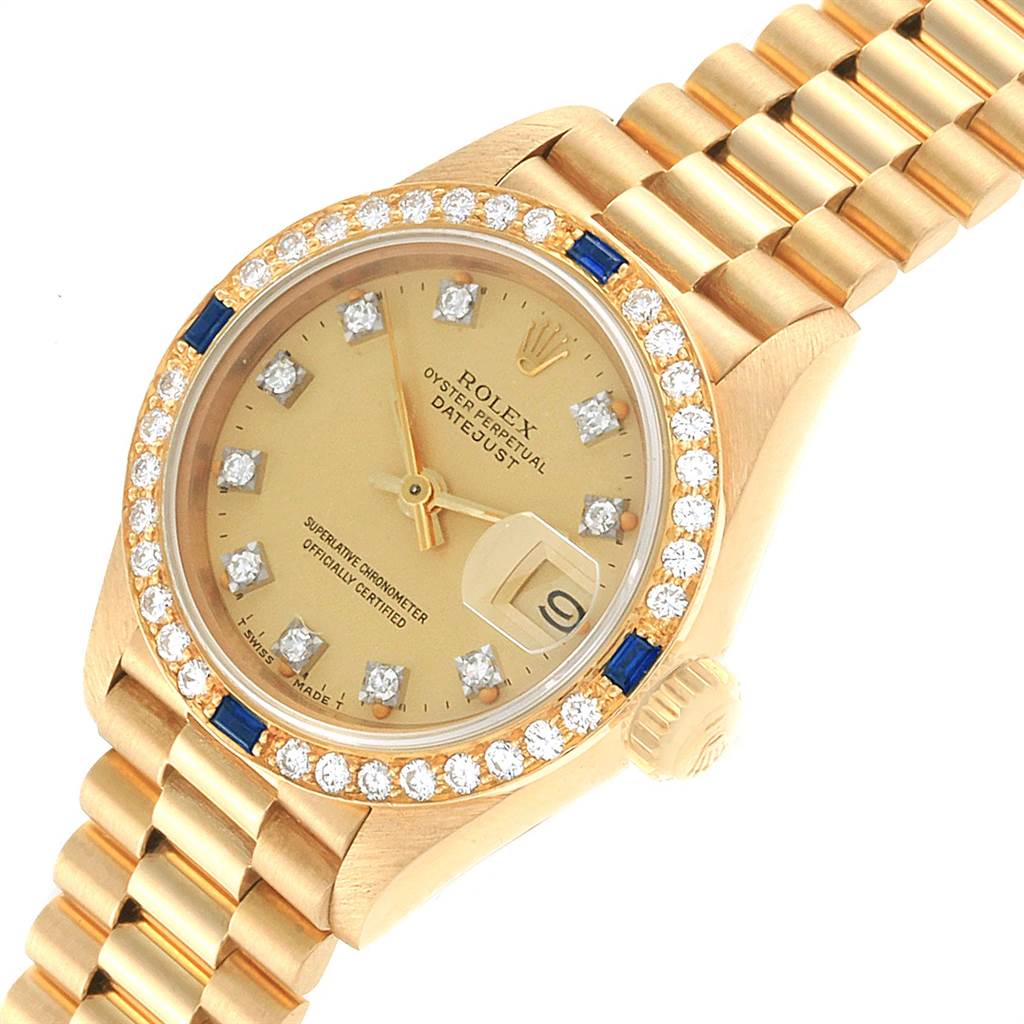 This image shows a close-up, angled view of a Rolex President 69088 Women
s Yellow Gold Champagne Dial 69088 Women
s Yellow Gold Champagne Dial Datejust watch, highlighting the dial, bezel, crown, and bracelet.