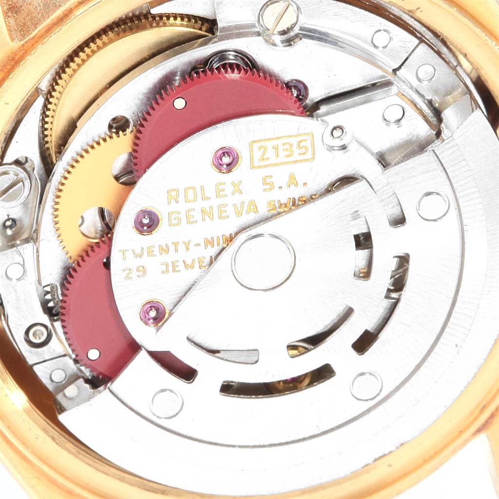 The image shows the internal movement mechanism of a Rolex President 69178 Women
s Yellow Gold Champagne Dial 69178 Women
s Yellow Gold Champagne Dial model watch from a close-up angle.
