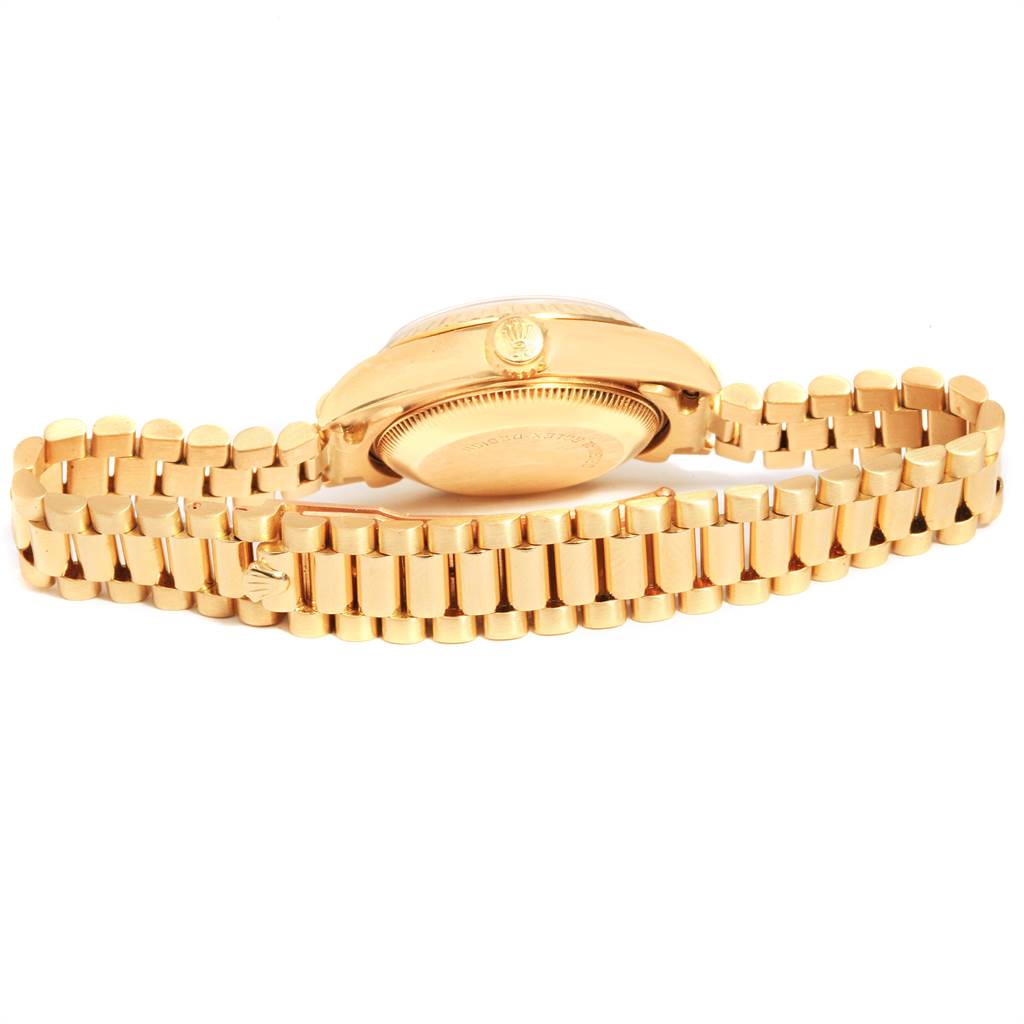 The image shows the side view and the bracelet of a gold Rolex President 69178 Women
s Yellow Gold Champagne Dial 69178 Women
s Yellow Gold Champagne Dial model watch.