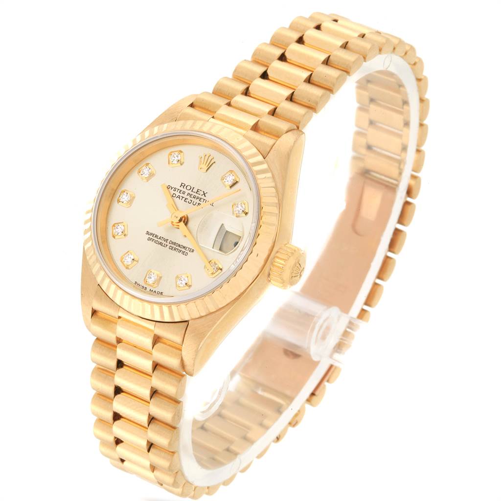 The image shows a side and front view of a Rolex President 69178 Women
s Yellow Gold Champagne Dial 69178 Women
s Yellow Gold Champagne Dial model watch, highlighting its gold bracelet, bezel, and diamond-set dial.