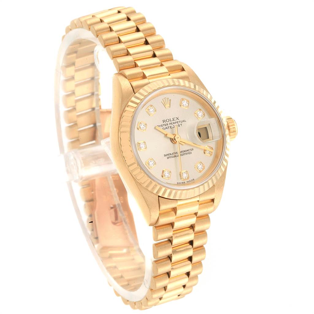 The Rolex President 69178 Women
s Yellow Gold Champagne Dial 69178 Women
s Yellow Gold Champagne Dial watch is shown at an angled side view, highlighting its gold band, bezel, dial, and markers.