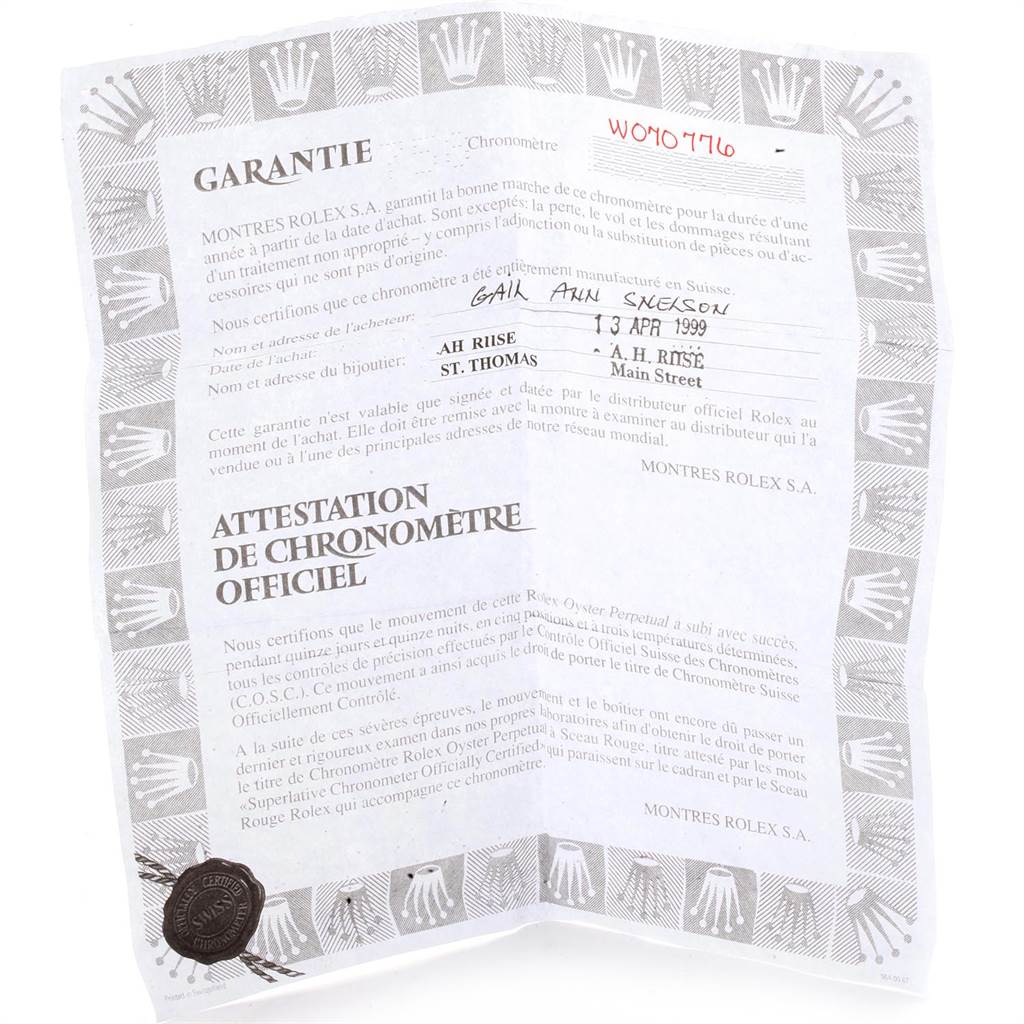 The image shows a Rolex warranty certificate for a President model, featuring text and logos.