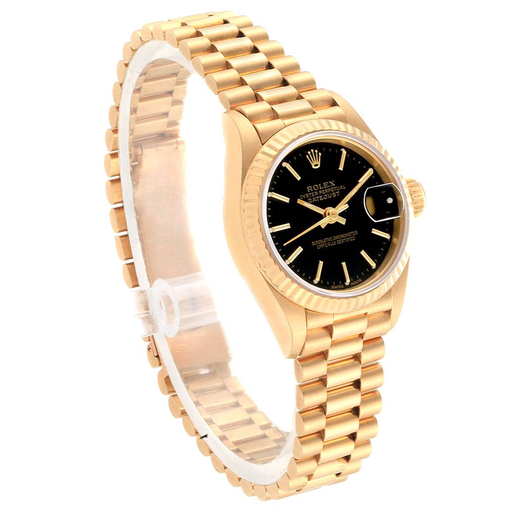 The President model Rolex watch is shown at a three-quarter angle, displaying the face, bezel, and bracelet.