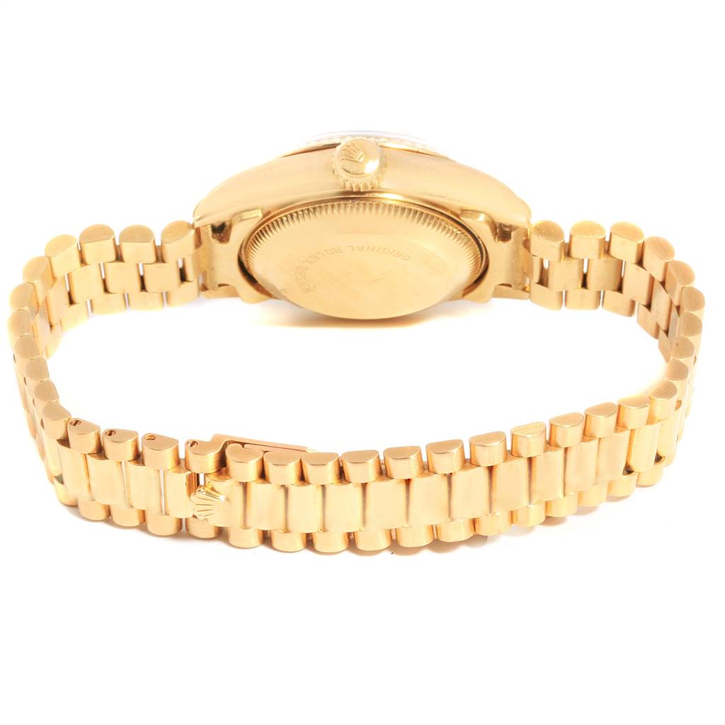 This image shows the back view of a Rolex President 69178 Women's Yellow Gold Black Dial 69178 Women's Yellow Gold Black Dial watch, highlighting the case back and bracelet.