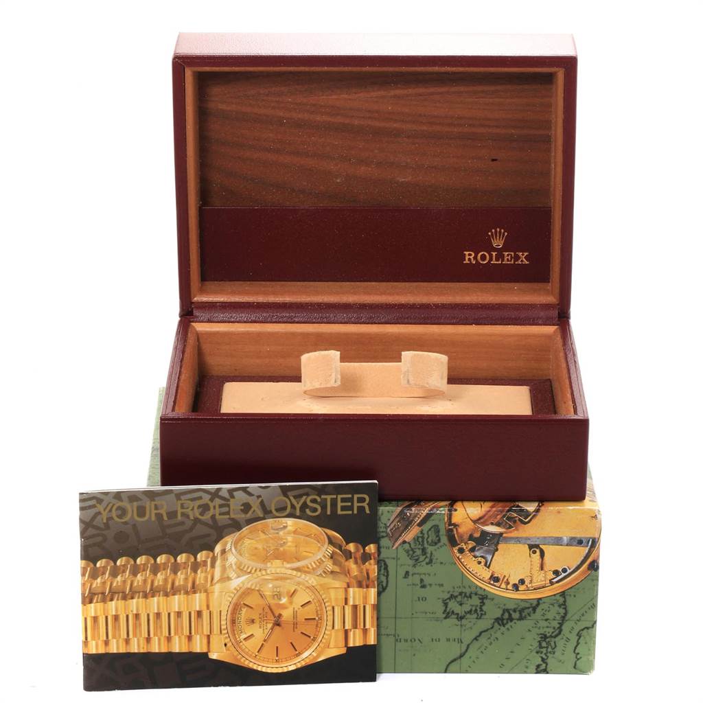 The image shows an empty Rolex President 68279 Women's White Gold Black Dial 68279 Women's White Gold Black Dial model watch box with the watch booklet and accessories.