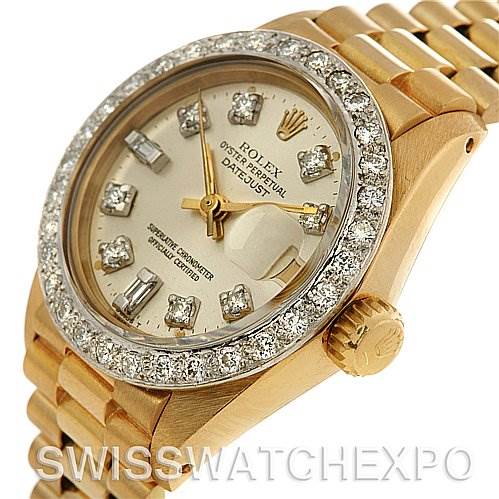 This image shows a close-up angle of a Rolex President 6917 Women's Yellow Gold  6917 Women's Yellow Gold  model watch, highlighting the face, bezel, and part of the bracelet.