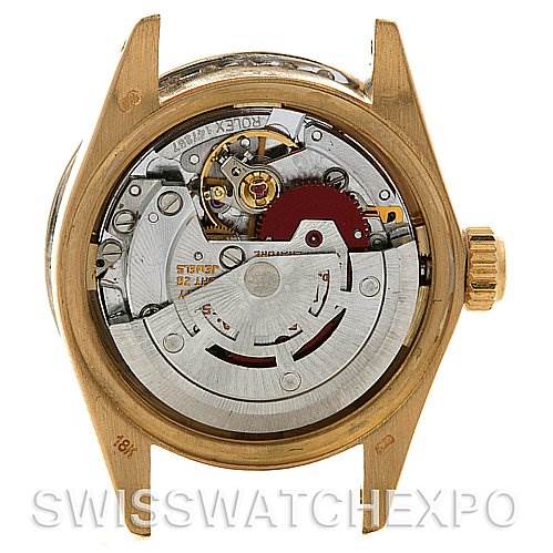 This photo shows the back view of a Rolex President 6917 Women's Yellow Gold  6917 Women's Yellow Gold  watch, revealing its internal mechanical movement.