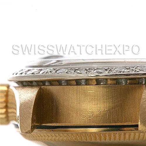 Side view of a Rolex President 6917 Women's Yellow Gold  6917 Women's Yellow Gold  watch showing the bezel, case, and part of the crown with visible engravings.