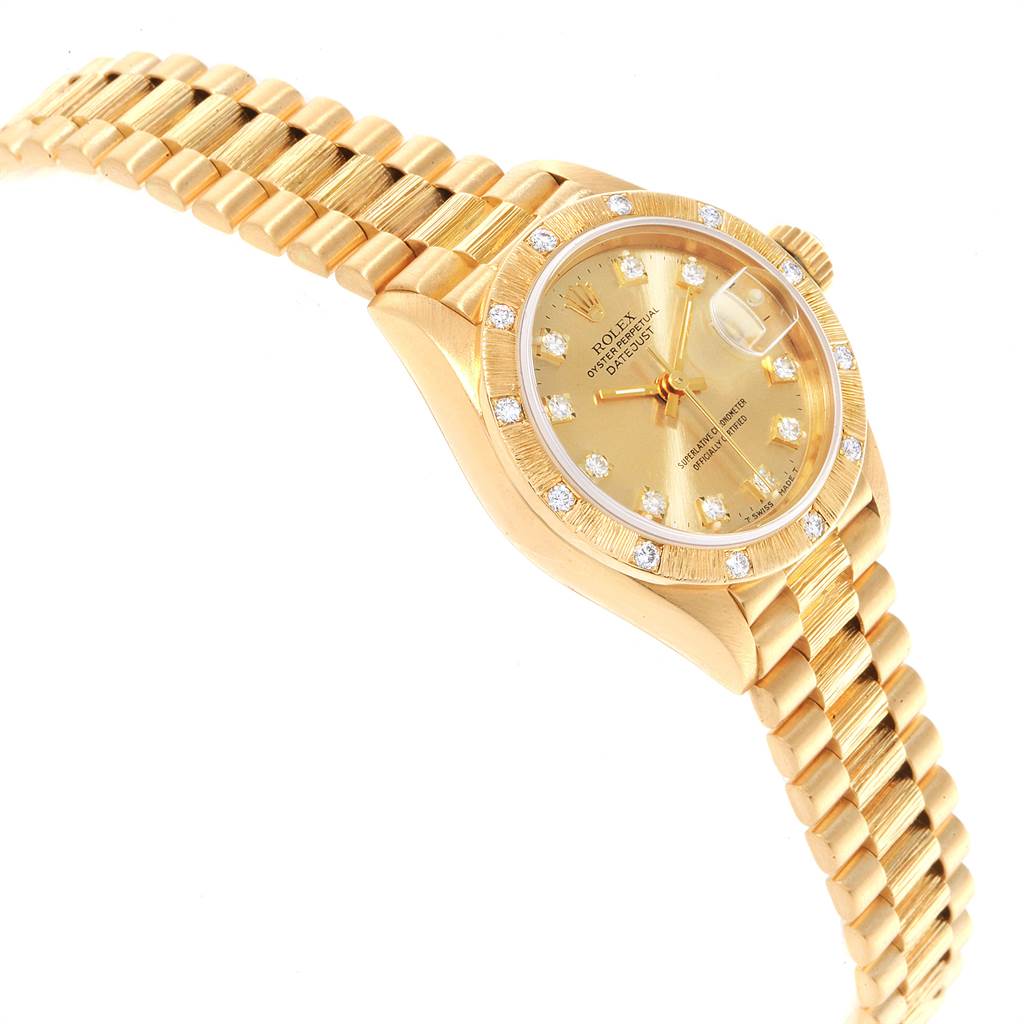 The Rolex President 69288 Women
s Yellow Gold Champagne Dial 69288 Women
s Yellow Gold Champagne Dial model watch is shown at a slight angle, displaying the bracelet, bezel, and dial with diamond markers.