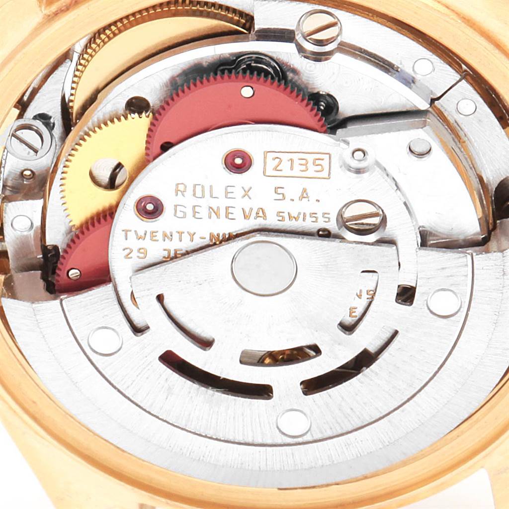 The image shows a close-up of the movement mechanism inside a Rolex President 69288 Women
s Yellow Gold Champagne Dial 69288 Women
s Yellow Gold Champagne Dial model watch.