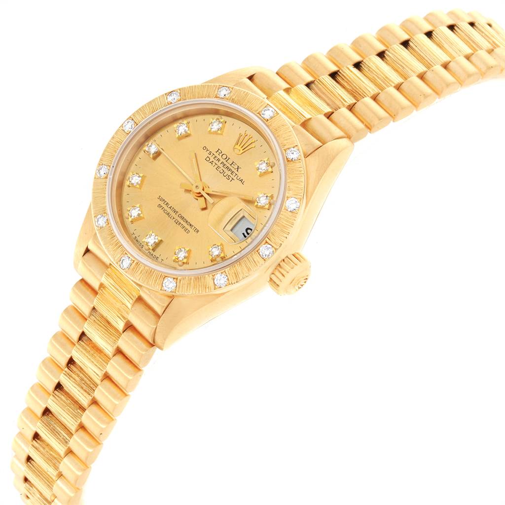 The Rolex President 69288 Women
s Yellow Gold Champagne Dial 69288 Women
s Yellow Gold Champagne Dial model watch is shown from an angled top view, displaying the face, bezel, crown, and bracelet.