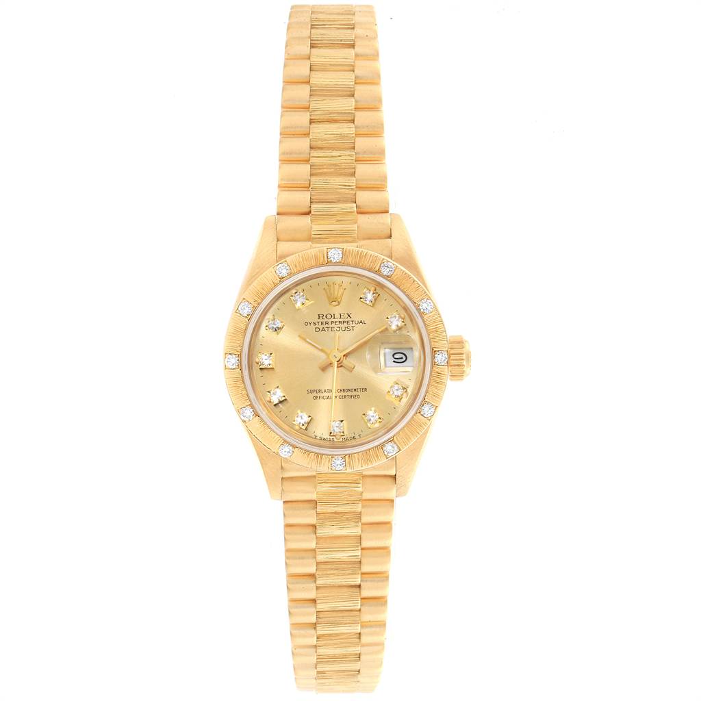 This image shows the Rolex President 69288 Women
s Yellow Gold Champagne Dial 69288 Women
s Yellow Gold Champagne Dial model watch from a top-down view, displaying its face, bezel, and bracelet.