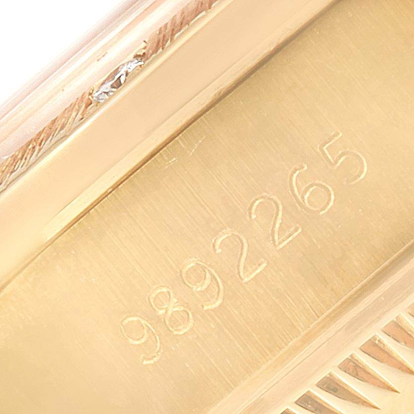 This close-up image of the Rolex President 69288 Women
s Yellow Gold Champagne Dial 69288 Women
s Yellow Gold Champagne Dial model shows the serial number engraved on the case.