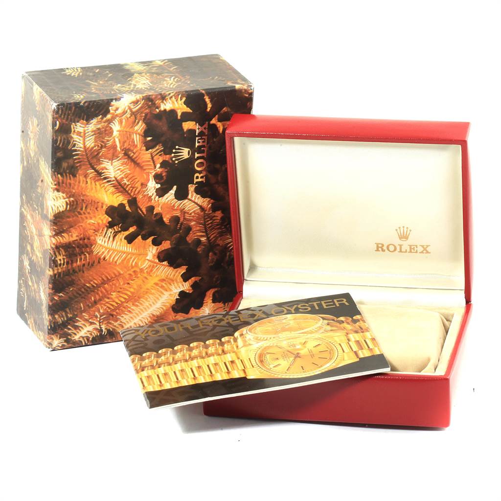 The image shows the packaging and warranty card for the Rolex President 69178 Women
s Yellow Gold Champagne Dial 69178 Women
s Yellow Gold Champagne Dial model watch, with the box open and the card partially visible.