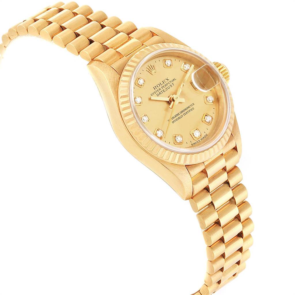 The image shows a Rolex President 69178 Women
s Yellow Gold Champagne Dial 69178 Women
s Yellow Gold Champagne Dial model watch at a slight side angle, highlighting the gold band, face, and diamond hour markers.