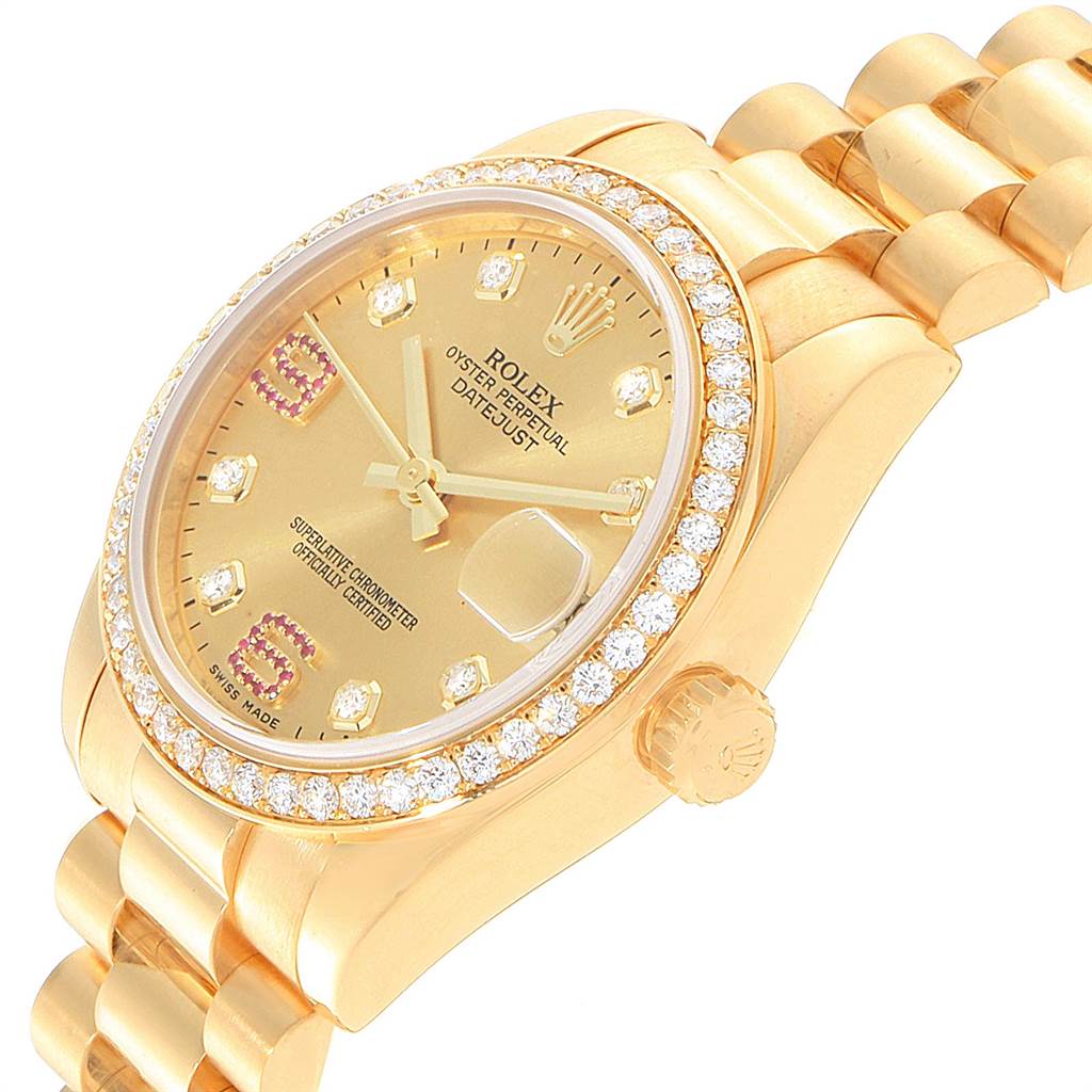 The image shows a Rolex President 178288 Women
s Yellow Gold Champagne Dial 178288 Women
s Yellow Gold Champagne Dial model watch at a slight angle, highlighting the gold dial, diamond bezel, and part of the bracelet.