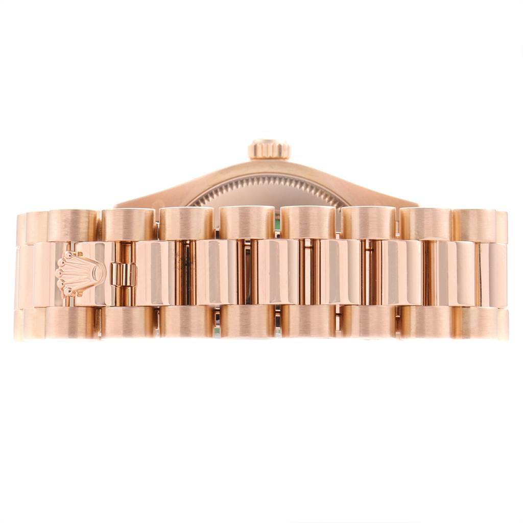 This image shows the bracelet and clasp of a Rolex President 178275 Women's Rose Gold Silver Dial 178275 Women's Rose Gold Silver Dial model watch viewed from the side.
