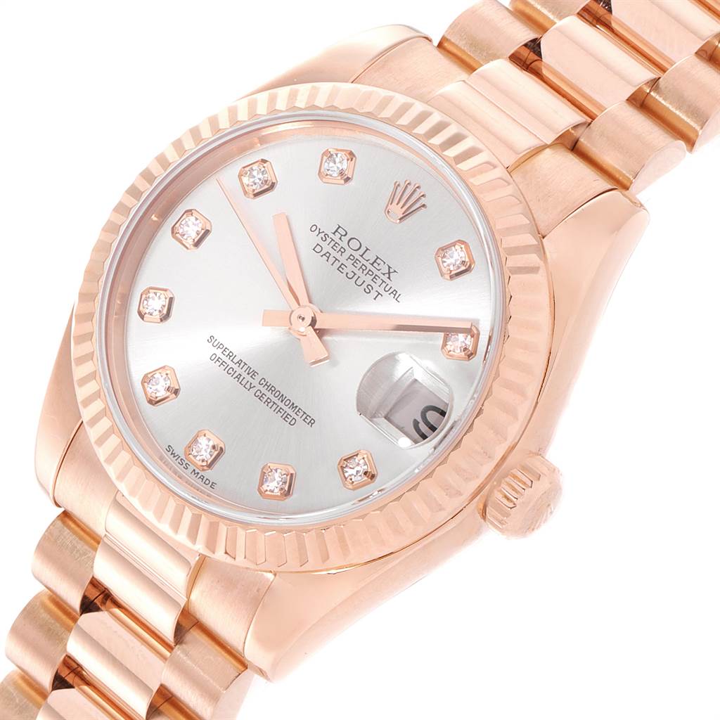 This image shows a close-up of a Rolex President 178275 Women's Rose Gold Silver Dial 178275 Women's Rose Gold Silver Dial model watch, featuring its face, crown, and part of the bracelet.