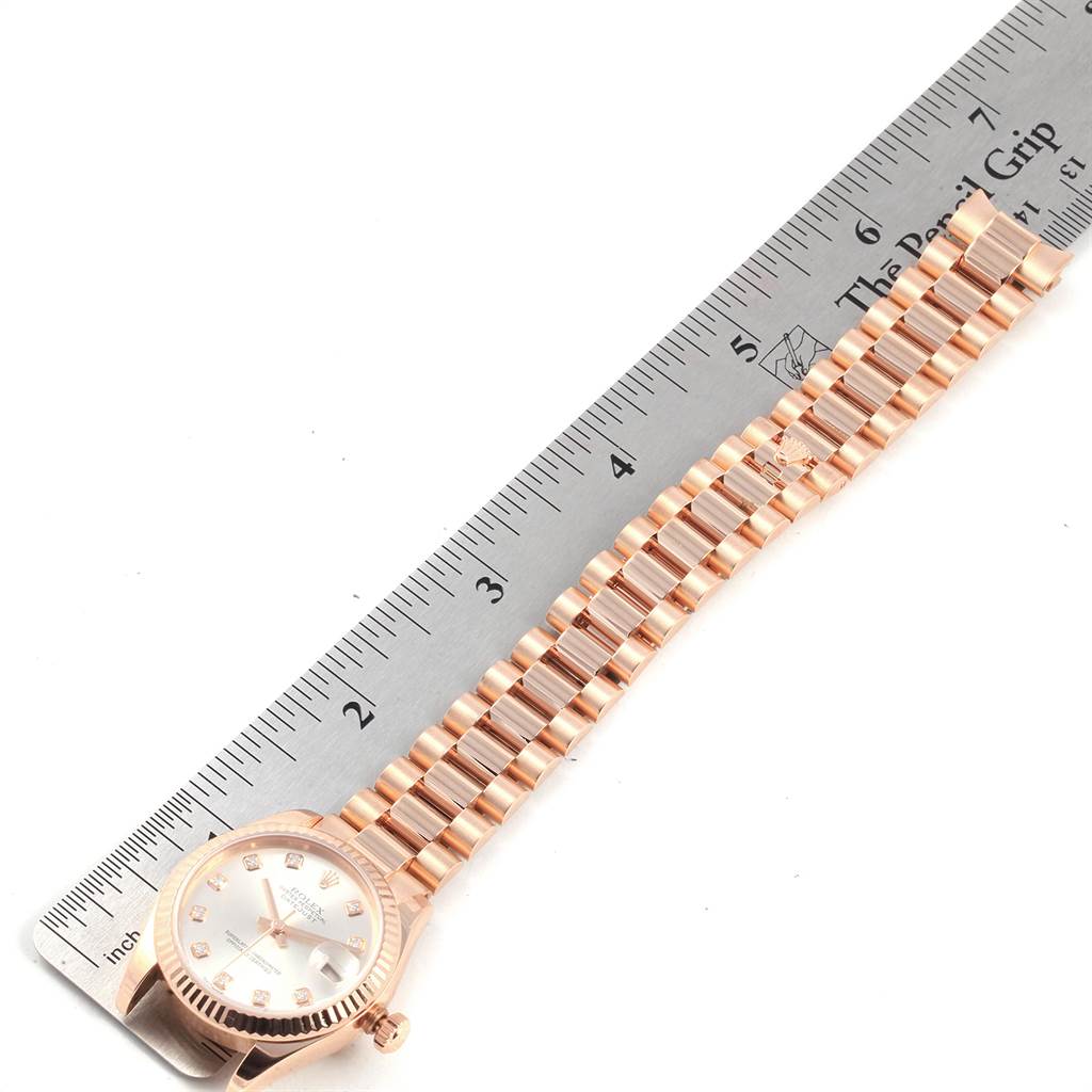 The image shows a Rolex President 178275 Women's Rose Gold Silver Dial 178275 Women's Rose Gold Silver Dial watch in a top-down view, including its bracelet and part of the watch case.