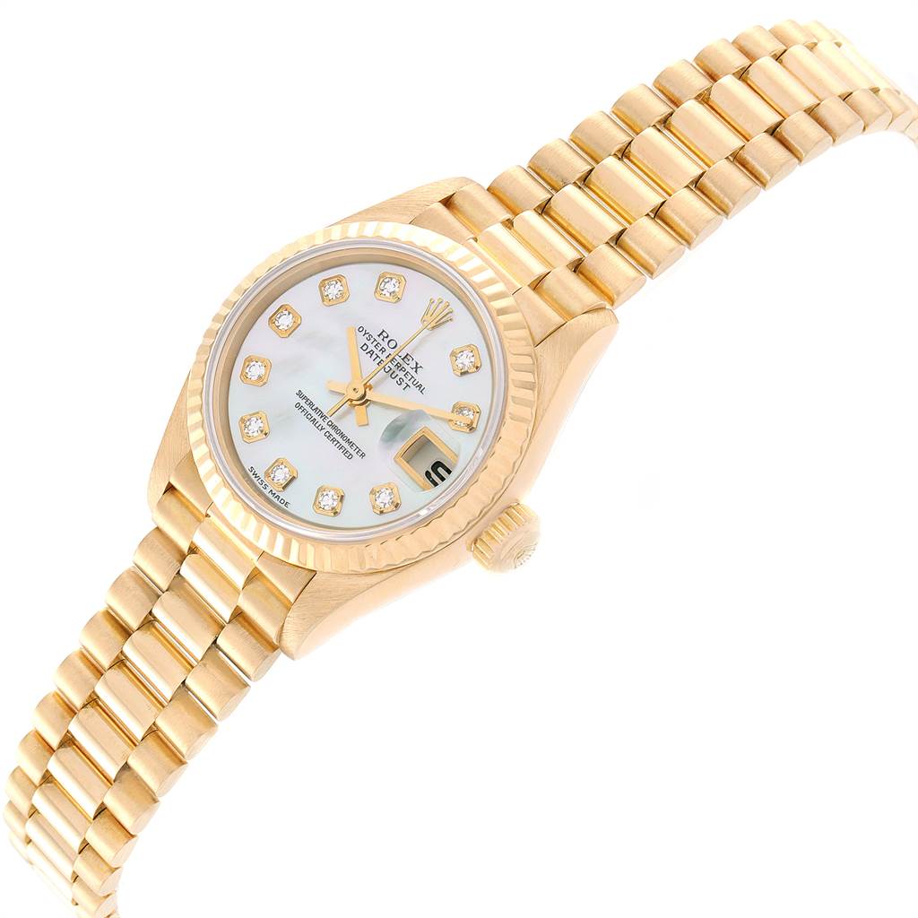 The image shows a Rolex President 79178 Women
s Yellow Gold Mother of Pearl Dial 79178 Women
s Yellow Gold Mother of Pearl Dial model watch at a slight angle, highlighting its gold bracelet, diamond hour markers, and date window.