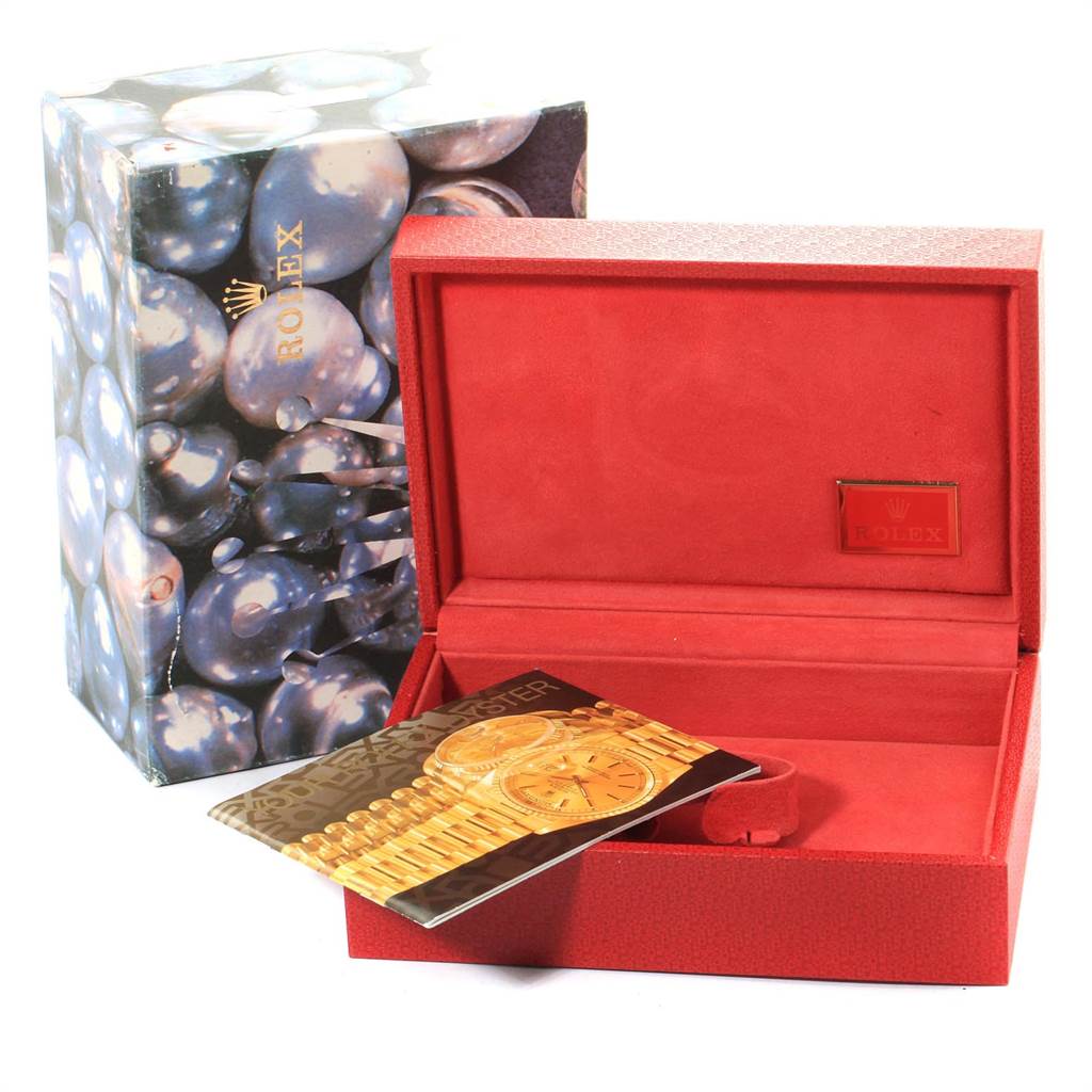 The image shows the packaging, including a decorated outer box, red inner box, and a booklet for the Rolex President 68278 Women
s Yellow Gold Champagne Dial 68278 Women
s Yellow Gold Champagne Dial model watch.