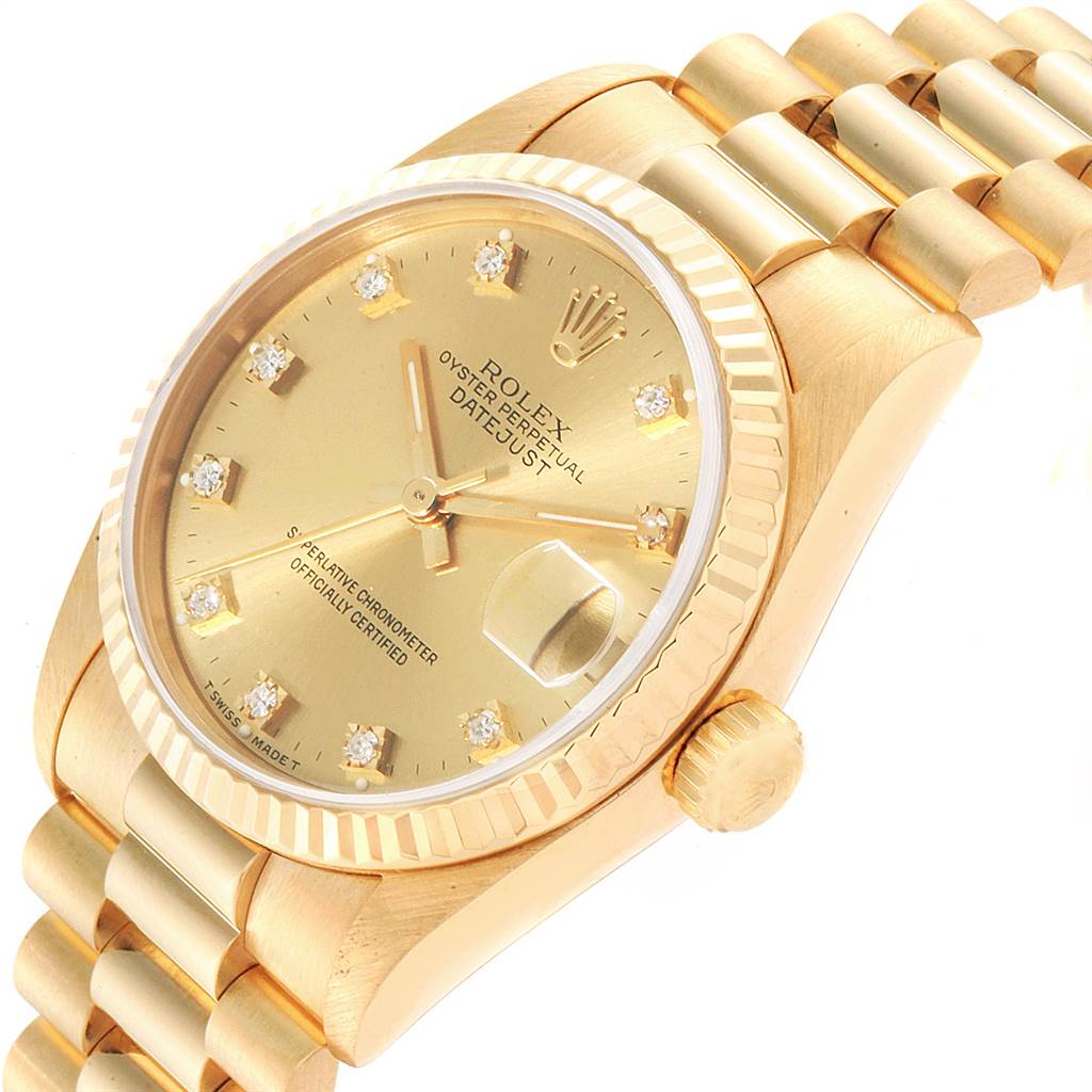 This image shows a side angle of the Rolex President 68278 Women
s Yellow Gold Champagne Dial 68278 Women
s Yellow Gold Champagne Dial model watch, featuring its dial, crown, and part of the bracelet.