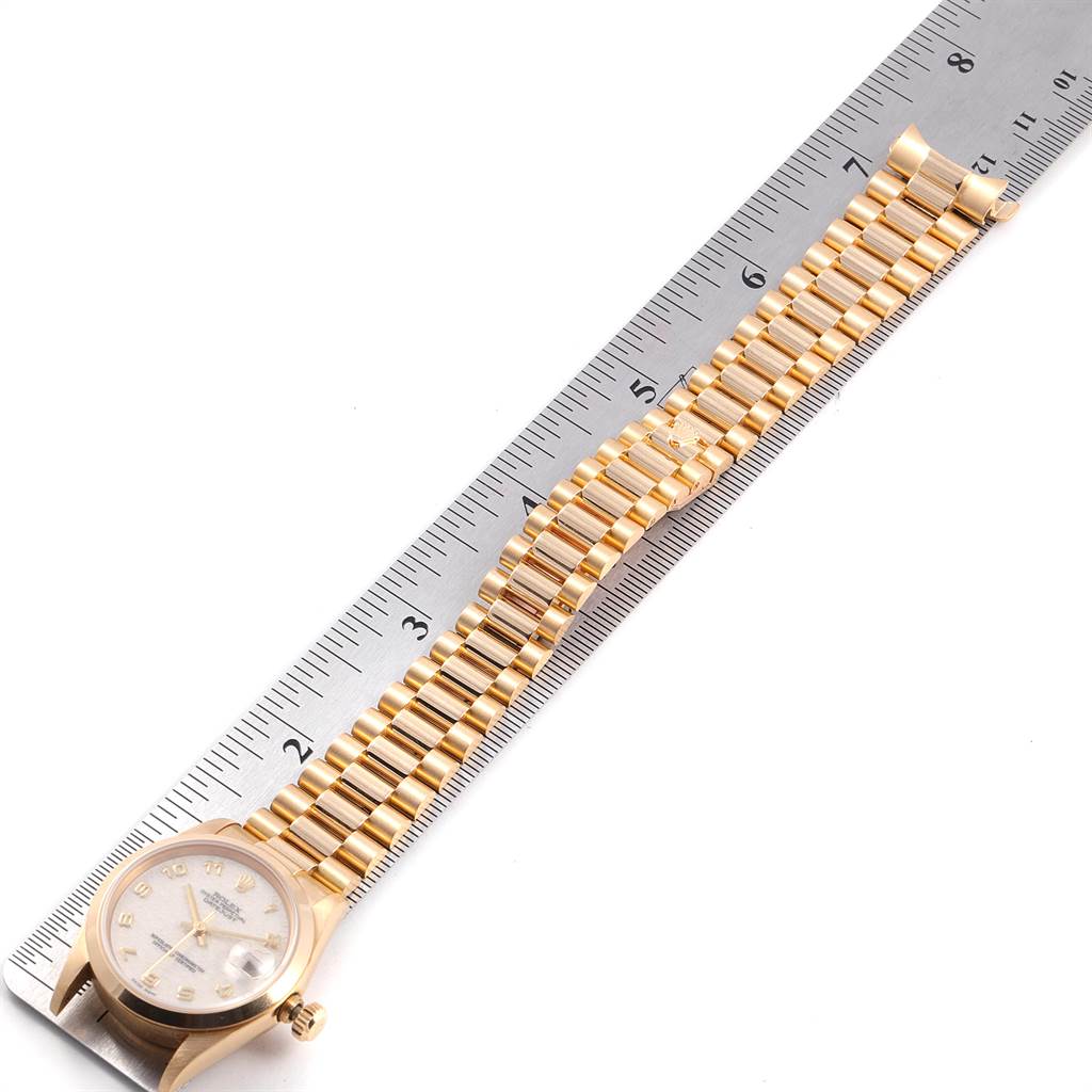 The image shows a Rolex President 68278 Women's Yellow Gold Beige Dial 68278 Women's Yellow Gold Beige Dial model watch laid flat next to a ruler.