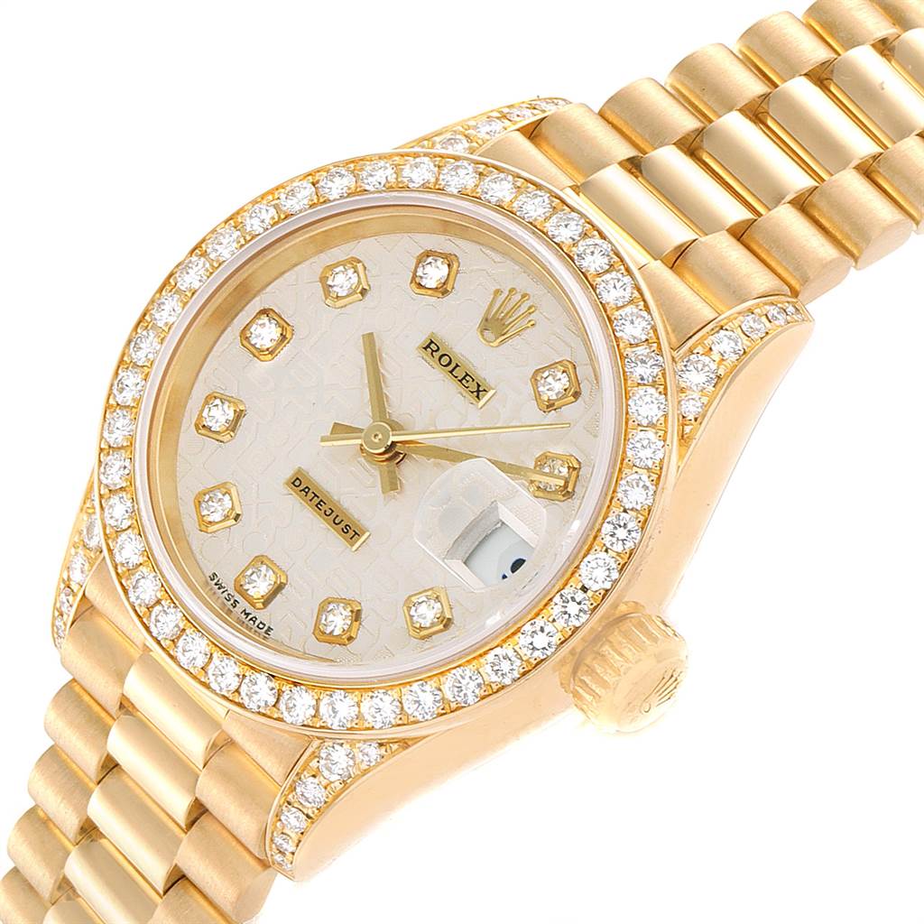 This image shows a close-up of the Rolex President 79158 Women's Yellow Gold Silver Dial 79158 Women's Yellow Gold Silver Dial model watch, highlighting its diamond bezel, dial, and part of the bracelet.