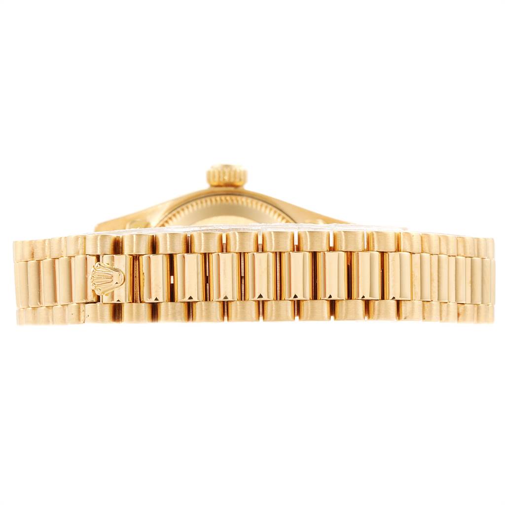This image shows a side view of the Rolex President 79158 Women's Yellow Gold Silver Dial 79158 Women's Yellow Gold Silver Dial model watch, focusing on the bracelet and part of the case.