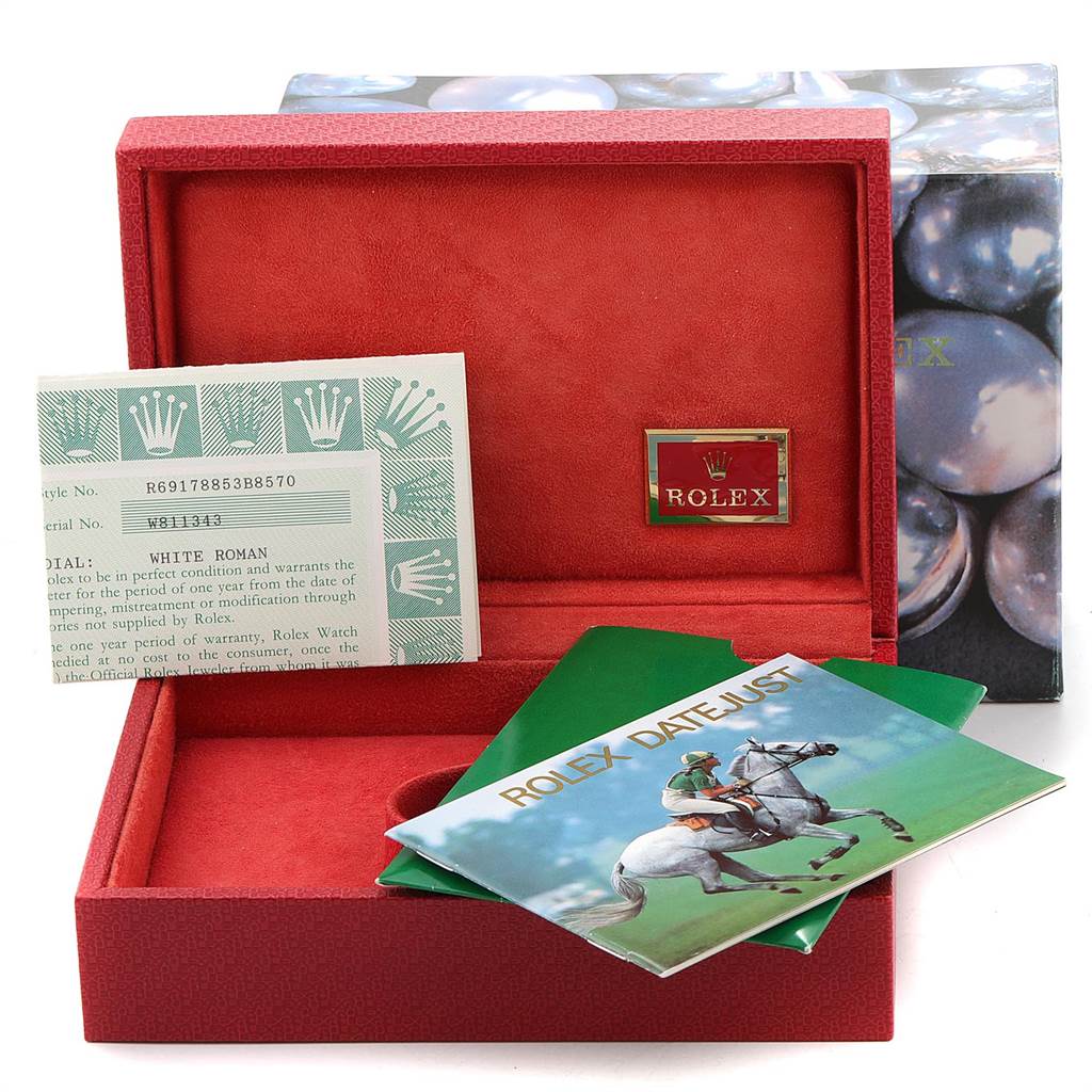 The image shows the open box, warranty card, and manuals for a Rolex President 69178 Women
s Yellow Gold White Dial 69178 Women
s Yellow Gold White Dial model watch.