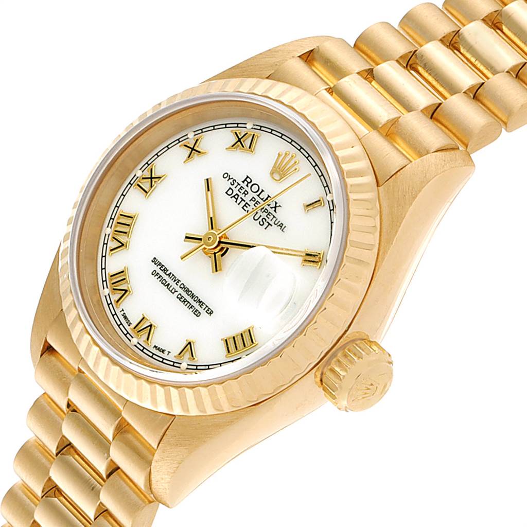 The image shows a close-up angle of a Rolex President 69178 Women
s Yellow Gold White Dial 69178 Women
s Yellow Gold White Dial model watch, highlighting the dial, bezel, crown, and part of the bracelet.